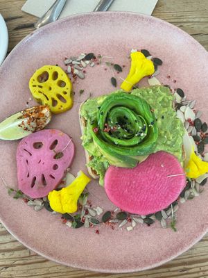Avocado toast with mixed pickled root vegetables
 at Brunch & Cake in Barcelona