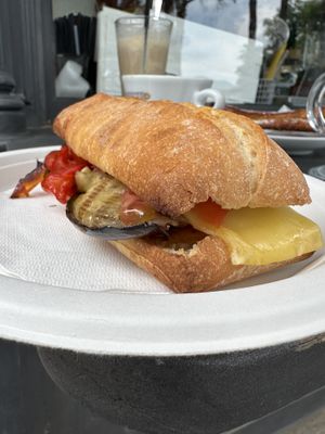 Panini Vegano (vegan mayo, vegan cheese, eggplant, peppers, & tomato) so goood  at Chiosco Del Prato in Toscana