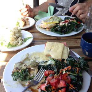 Splitting two brunch entrees: the savory crepe and the tofu benedict with kale side salad (with strawberries, almonds, carrot and a balsamic vinaigrette). Yummy! at Two Mammas Vegan Kitchen in Oakland