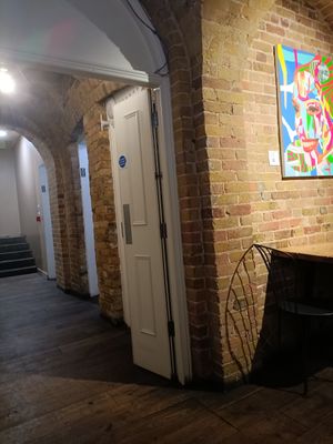 Toilets at start of basement area at Club Mexicana in West London