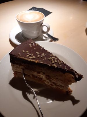 Snickers cake & cappuccino at Vegan Restoran V in Tallinn