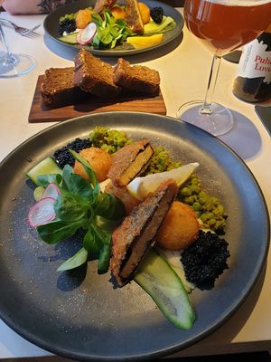 Vegan "fish & chips" - breaded tofish, potato & cheese croquettes, tartar sauce,
green pea & mint mash at Vegan Restoran V in Tallinn