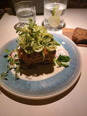 Vegan lasagna with some bread. at Vegan Restoran V in Tallinn