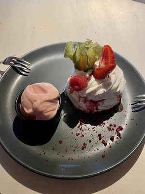 Meringue with passionfruit filling and vegan strawberry ice cream at Vegan Restoran V in Tallinn