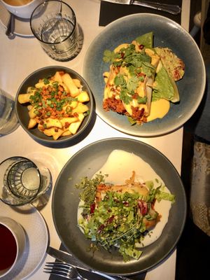 Lasagna, tacos, pommes frites with cheese sauce  at Vegan Restoran V in Tallinn