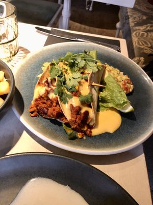 pommes frites with cheese sauce  at Vegan Restoran V in Tallinn