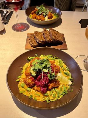 Curry sauce rice noodles with cauliflower fries  at Vegan Restoran V in Tallinn