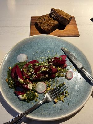 Beetroot ravioli with dark Estonian bread at Vegan Restoran V in Tallinn