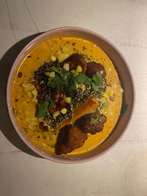 Lightly spicy oven-roasted sweet potato with breaded cauliflower, quinoa and  coconut-tomato saucE at Vegan Restoran V in Tallinn