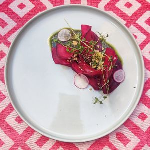 Beetroot ravioli with cashew cream cheese and basil pesto at Vegan Restoran V in Tallinn