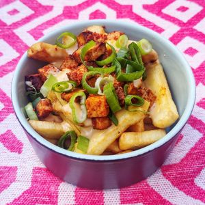 Fries with smokey tofu and cheese sauce at Vegan Restoran V in Tallinn