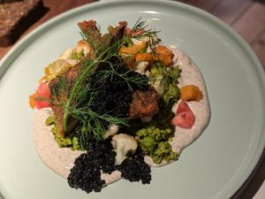 It's a must! Tofish pea-tarragon mash, warm vegetable salad with vegan  caviar and miso-yogurt-mayonnaise sauce at Vegan Restoran V in Tallinn