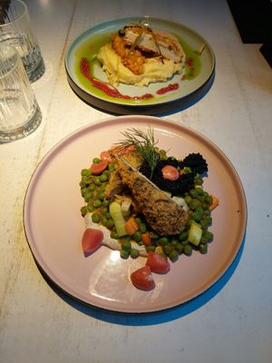 Tofish pea-tarragon mash, warm vegetable salad with vegan  caviar and miso-yogurt-mayonnaise sauce & Breaded ‘chicken’ with herb sheese, potato puree and sun-dried tomato sauce at Vegan Restoran V in Tallinn