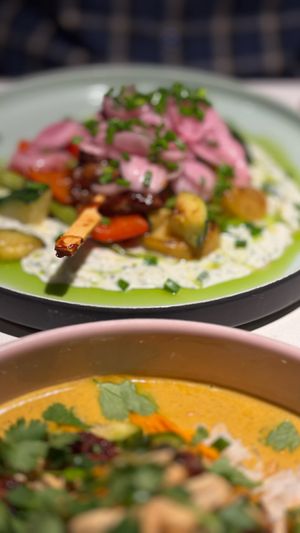 BBQ soy skewer with fried early potatoes, vegetables and mint tzatziki sauce at Vegan Restoran V in Tallinn