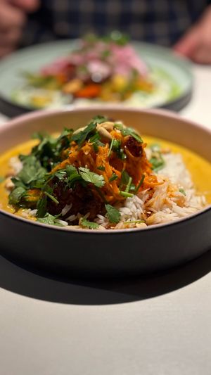 Peanut curry with breaded cauliflower, chilli sauce and cucumber-carrot salad at Vegan Restoran V in Tallinn