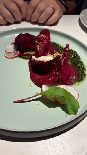 Beetroot ravioli with cashew cream sheese and basil pesto at Vegan Restoran V in Tallinn