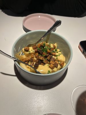 Starter fries with vegan cheese sauce and smokey tofu  at Vegan Restoran V in Tallinn
