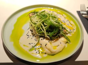 Mati's fishless fillet with cauliflower-cele- riac puree, warm vegetable salad, white wine sauce and wakame-cucumber salad at Vegan Restoran V in Tallinn