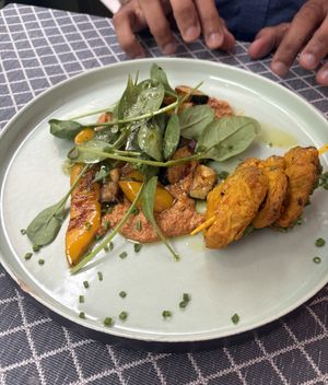 Spicy skewers on tasty Muhammara  at Vegan Restoran V in Tallinn