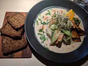 Orange-flavoured tempeh, brown rice, coconut-peanut sauce at Vegan Restoran V in Tallinn