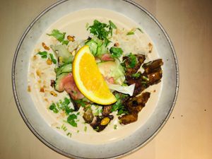 orange flavoured tempeh and peanut and coconut sauce  at Vegan Restoran V in Tallinn