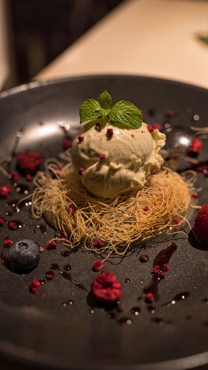 Pear ice cream on a cinnamon kataifi pillow at Vegan Restoran V in Tallinn