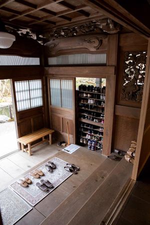 Entryway where you leave your shoes during your stay at Ekoin in Koya