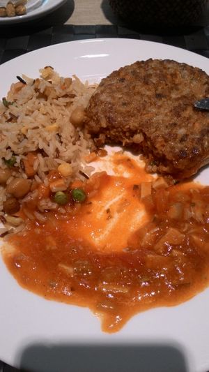 Veggie burguer (veggies and texturized soy) with tomato with soy, and rice with soy, beans and chickpeas. at Tast i mes Natural in Barcelona