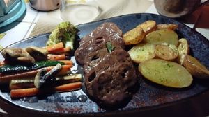 Seitan with roast potatoes and veggies at Temple Natura in Mallorca