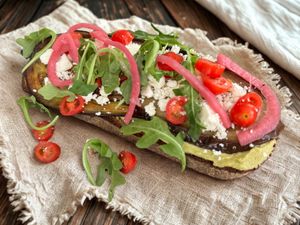 Our incredible vegan or vegetarian breakfast toast made on artisan sourdough bread and fresh ingredients  at Plazores Café & Bar in Diez
