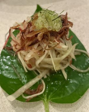 Peanut & papaya relish, pomelo, betel leaf & finger lime $9.00  at Nu Nu in Palm Cove