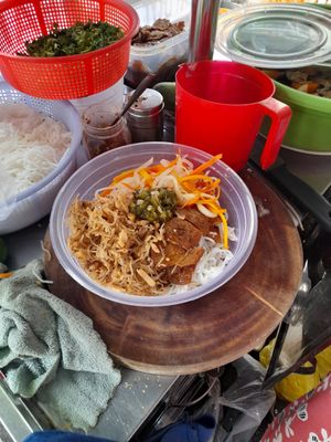 Preparing my take away vegan food at Quán Chay Kinh Moi in Ho Chi Minh City