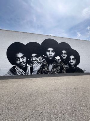 Jackson 5 mural across the street   at Tiny's Coffee Bar in Gary