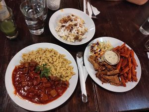 goat cheeze pasta, gyros plate, goulash at Kozmosz Vegan Etterem in Budapest