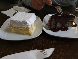 left cake - amazing, right cake - layered pancake, also good if you're into walnuts at Kozmosz Vegan Etterem in Budapest
