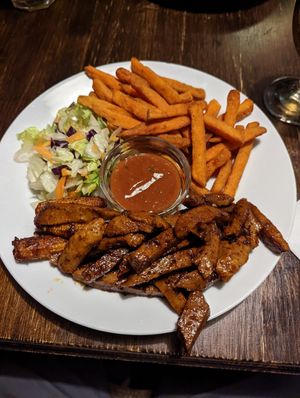 BBQ Seitan with sweet potato fries at Kozmosz Vegan Etterem in Budapest
