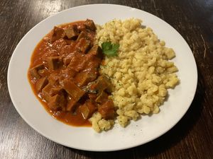Seitan stew with nokedli .  at Kozmosz Vegan Etterem in Budapest