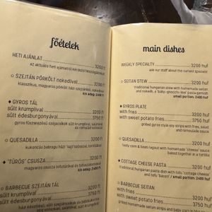 Menu has English on one side    at Kozmosz Vegan Etterem in Budapest