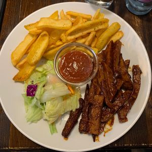 Barbecue seitan with fries (3.200 Ft) at Kozmosz Vegan Etterem in Budapest