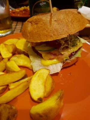 beetroot burger with extra cheese  at Kozmosz Vegan Etterem in Budapest