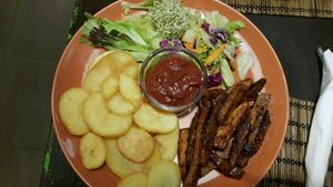 Seitan with barbecue sauce  at Kozmosz Vegan Etterem in Budapest