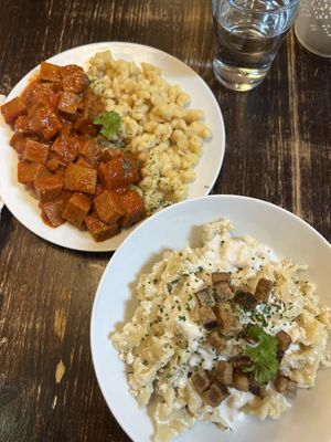 Seitan stew with knodel + cottage cheese pasta   at Kozmosz Vegan Etterem in Budapest