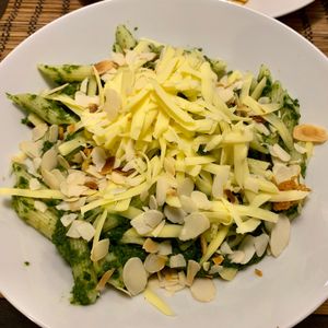 Spinach penne with almonds vegan sausage   at Kozmosz Vegan Etterem in Budapest