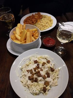 Baby gnochi and seitan stew and cottage cheese pasta with bacon tofu at Kozmosz Vegan Etterem in Budapest