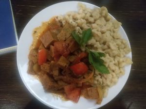 Beef stew with dumplings - forget the stew, the dumplings are the star at Kozmosz Vegan Etterem in Budapest