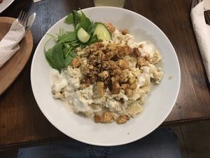 Cottage cheese pasta -traditional Hungerian dish “Turus csusza”  at Kozmosz Vegan Etterem in Budapest