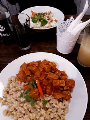 Cottage pasta & seitan stew (jus de poire super bon également) at Kozmosz Vegan Etterem in Budapest