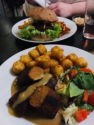 Bean burger + chickpea-seitan steak at Kozmosz Vegan Etterem in Budapest