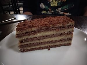 This layered walnut cake! at Kozmosz Vegan Etterem in Budapest