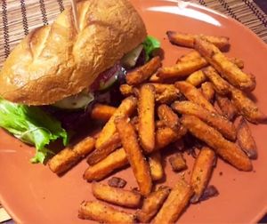 Burger with sweet potatoe fries at Kozmosz Vegan Etterem in Budapest